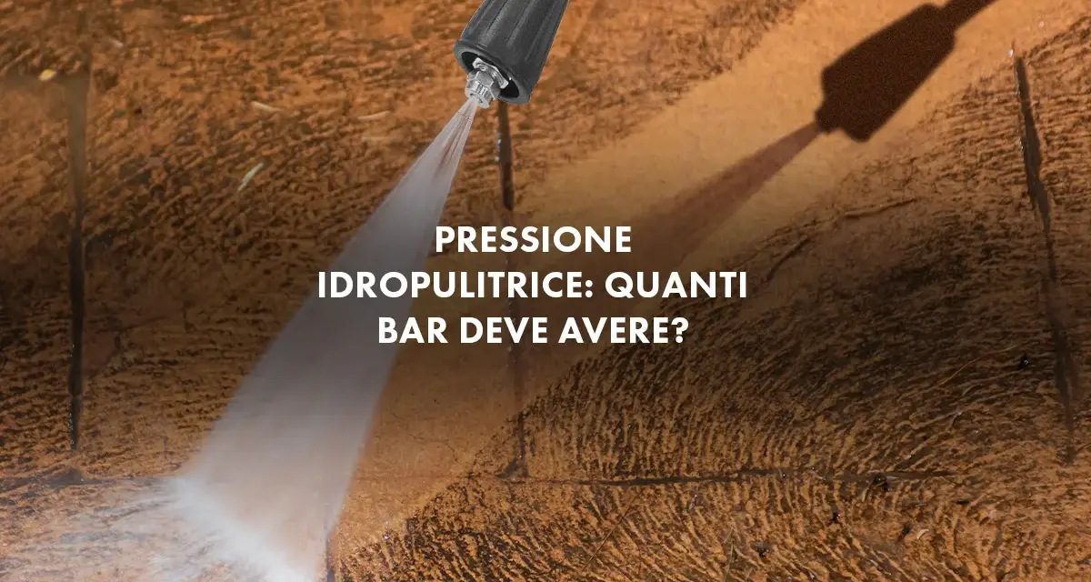 Ugello idropulitrice spruzza acqua su una superficie ruvida. La domanda è: quanti bar deve avere una buona idropulitrice per pulire efficacemente?