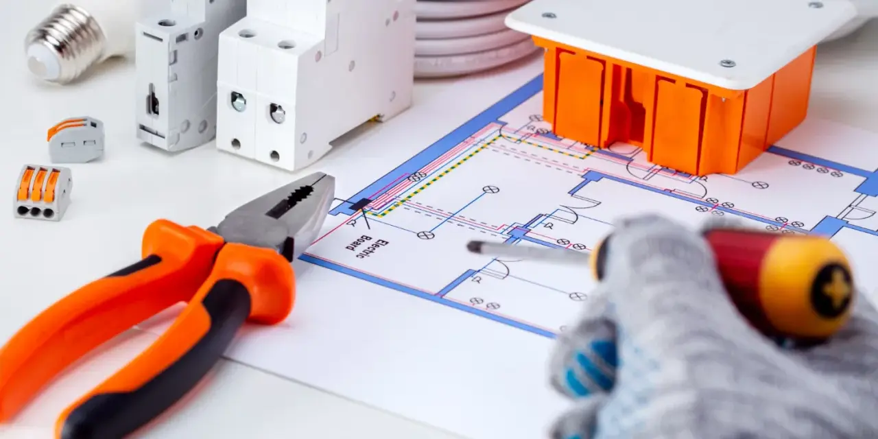 Schema elettrico con componenti per la messa a terra impianto elettrico: pinza, cacciavite, interruttori, scatola, lampadina e cavi.