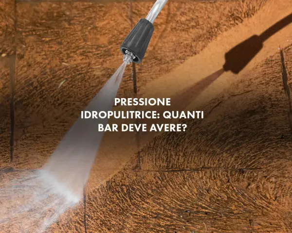 Ugello idropulitrice spruzza acqua su una superficie ruvida. La domanda è: quanti bar deve avere una buona idropulitrice per pulire efficacemente?